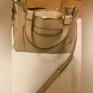 Steve Madden cream handbag.